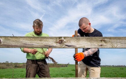 COUNTY CLARE: Hometree, 8 April 2025 – Jeremy Turkington (left), Seed Collector and Seed Bank Coordinator with Hometree, teaching tree planting and helping Enda O’Brien, one of the volunteers from Hometree’s Spring Experience Week. Hometree is a tree-planting charity at the forefront of nature restoration, connecting people to nature and challenging the unfolding climate crisis. 
