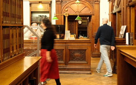 people walking into reading room