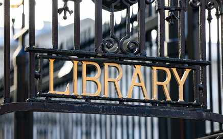 National Library of Ireland main entrance gate with black railings and gold lettering